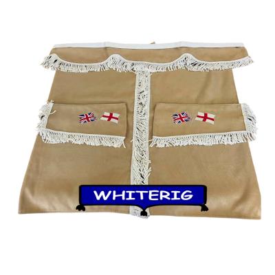 Beige faux suede show van curtains finished with white fringe trim and embroidered Union Jack and England flags. A stylish and patriotic upgrade for custom van interiors. Whiterig Truck Curtains